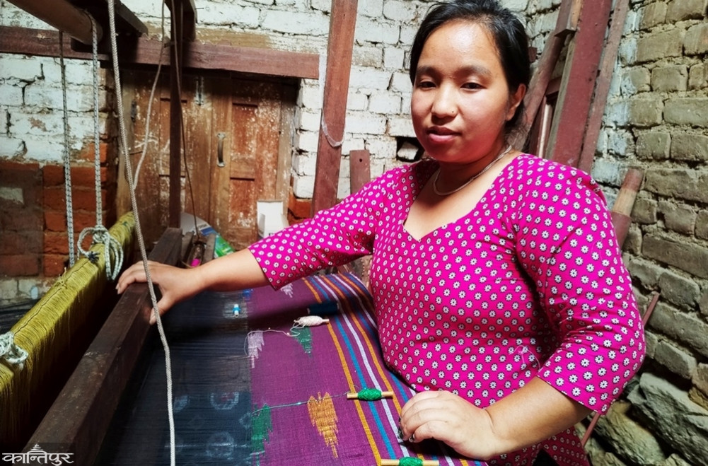 Manu, weaving her family's future along with Dhaka clothes on the handloom